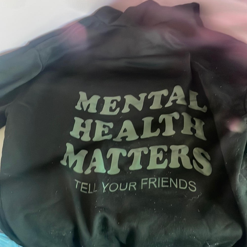 xl black hoodie that say mental health matters on the back